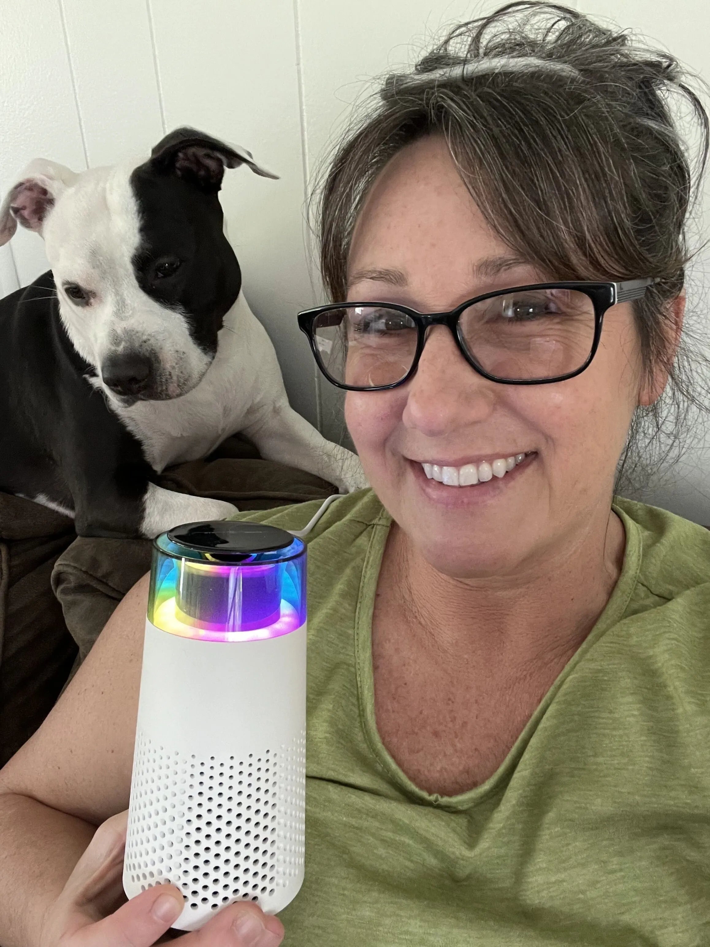 Customer holding Puppy Kind product information