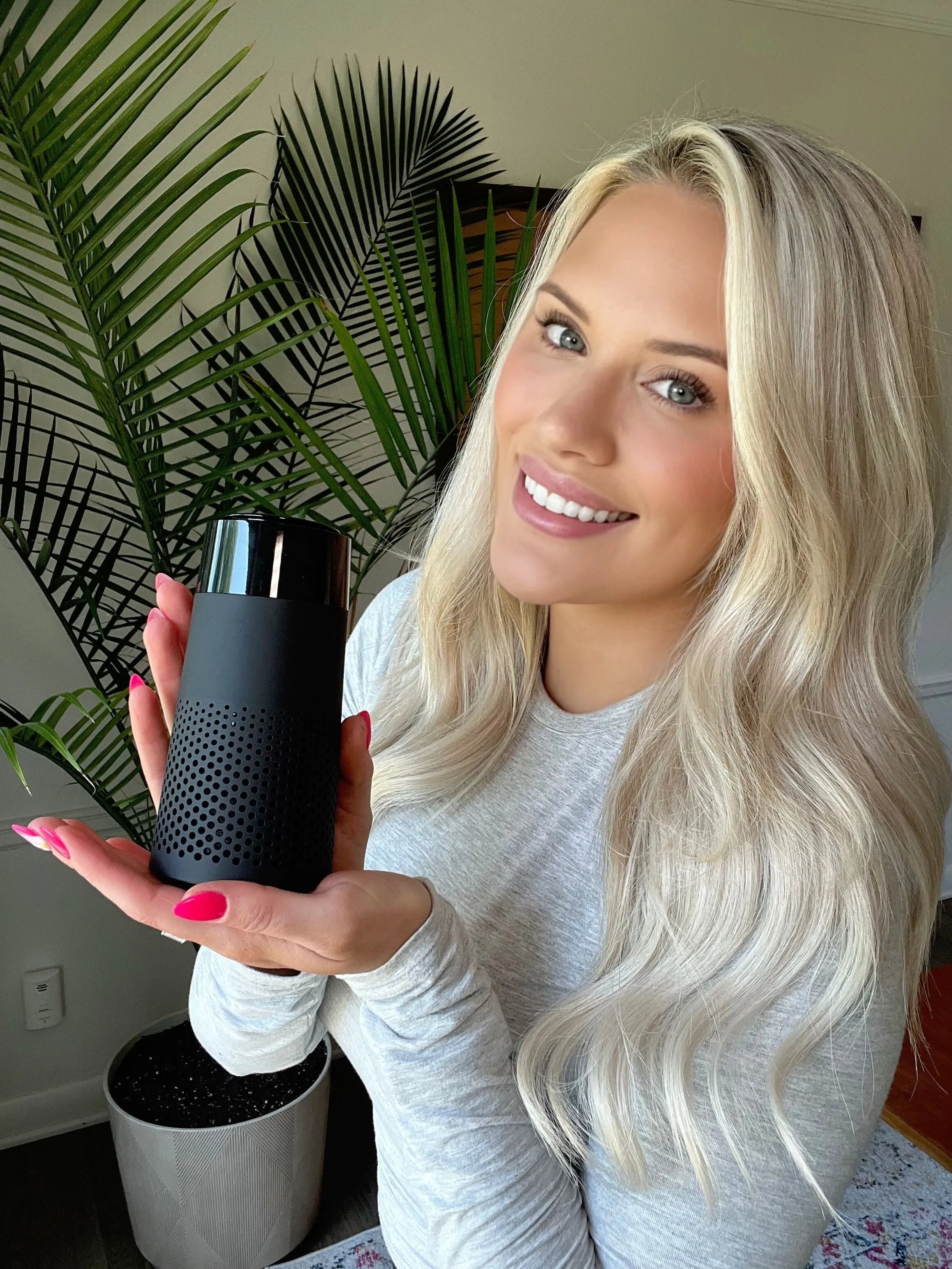 Customer holding a Pet Air Purifier